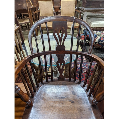 34 - A mid 19th century Derbyshire area yew and elm Windsor elbow chair, width 57cm, depth 40cm, height 9... 