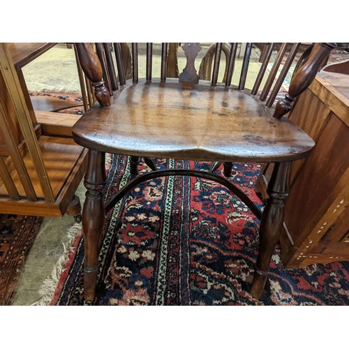 34 - A mid 19th century Derbyshire area yew and elm Windsor elbow chair, width 57cm, depth 40cm, height 9... 