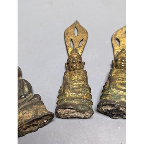 343 - Four brass Buddha