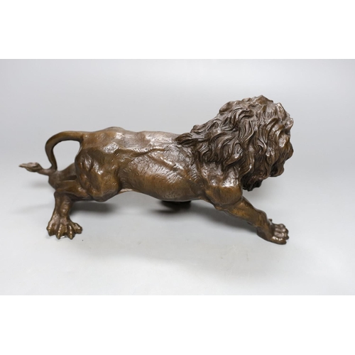 357 - A bronze lion, bearing a signature, Rodin, 31cm.