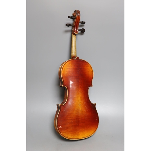 363 - A cased 3/4 size violin, 55cms long.