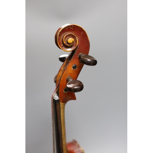 363 - A cased 3/4 size violin, 55cms long.