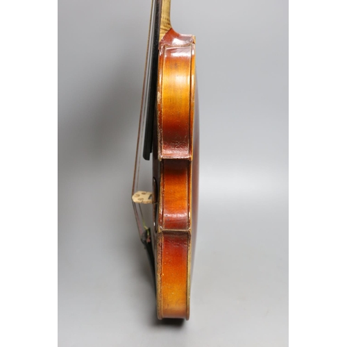 363 - A cased 3/4 size violin, 55cms long.