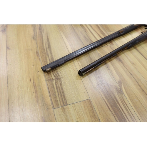 364 - Two 19th century percussion muskets, 103cm. max., one double-barrelled