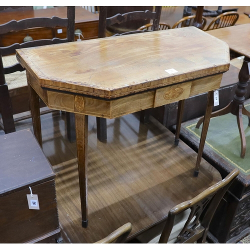 27 - A George III banded and inlaid mahogany folding card table, width 91cm, depth 44cm, height 75cm... 