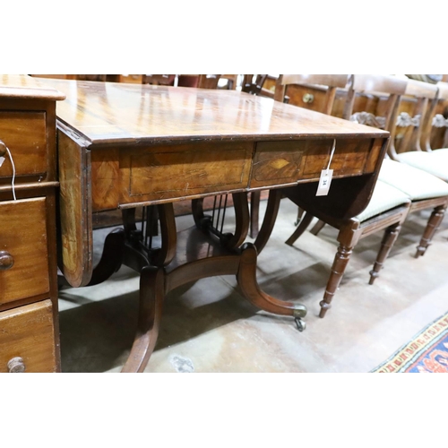 34 - A Regency tulip banded mahogany sofa table, width 87cm, height 70cm