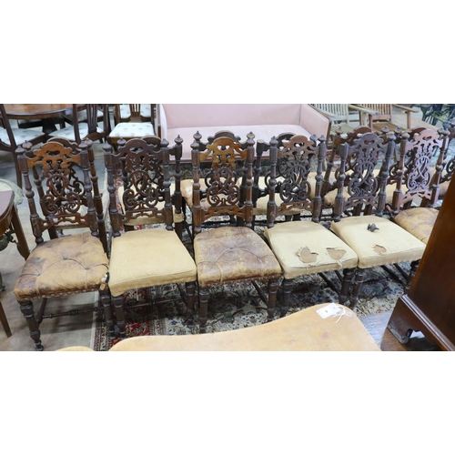 38 - A set of fourteen 19th century Continental carved oak dining chairs