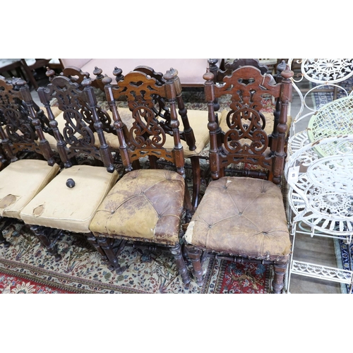 38 - A set of fourteen 19th century Continental carved oak dining chairs