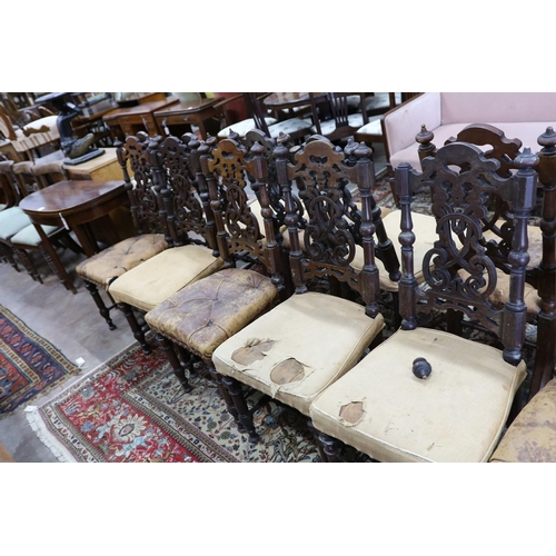38 - A set of fourteen 19th century Continental carved oak dining chairs