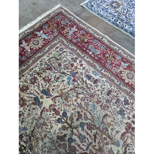 39 - A Tabriz ivory ground pictorial rug (signed), 390 x 294cm