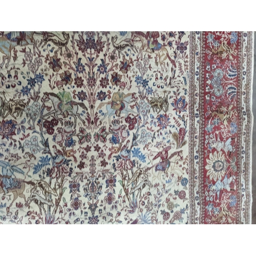 39 - A Tabriz ivory ground pictorial rug (signed), 390 x 294cm