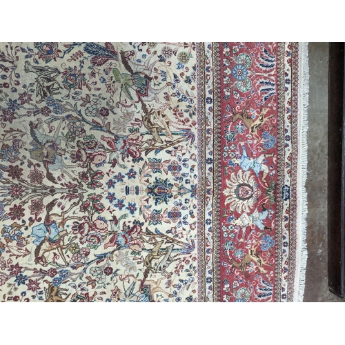 39 - A Tabriz ivory ground pictorial rug (signed), 390 x 294cm