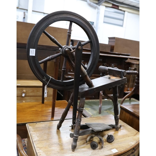 50 - A reproduction spinning wheel, height 90cm