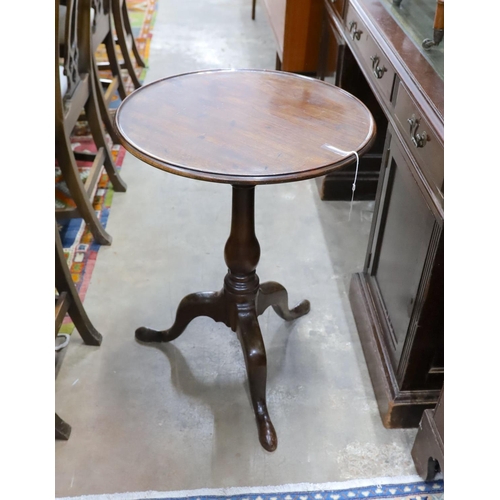 52 - A George III mahogany circular tilt top tripod table, diameter 50cm, height 70cm