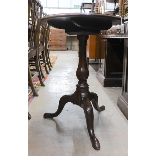52 - A George III mahogany circular tilt top tripod table, diameter 50cm, height 70cm