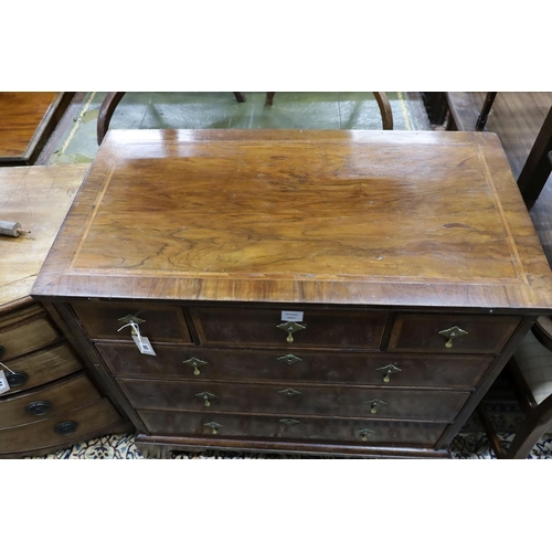 53 - An early 18th century feather banded walnut chest of drawers, width 96cm, depth 53cm, height 92cm... 