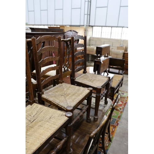 54 - A set of six oak rush seat ladder back chairs