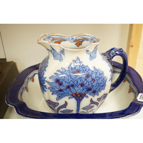 1373 - A Doulton Burslem "Tudor" pattern pottery toilet jug, basin a toothbrush vase, af (3)... 