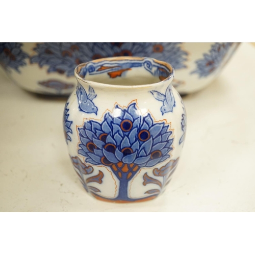 1373 - A Doulton Burslem "Tudor" pattern pottery toilet jug, basin a toothbrush vase, af (3)... 