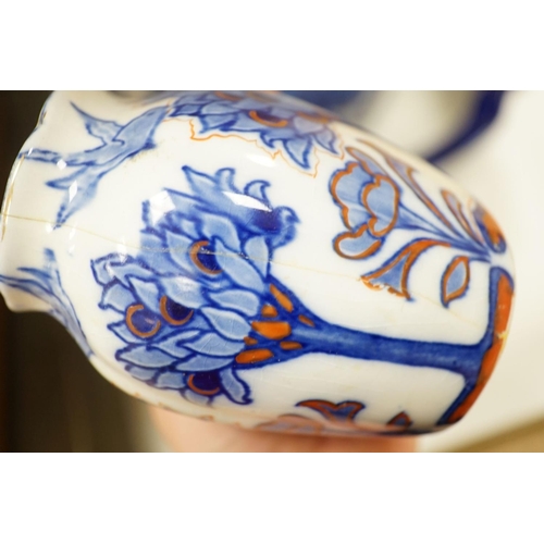 1373 - A Doulton Burslem "Tudor" pattern pottery toilet jug, basin a toothbrush vase, af (3)... 