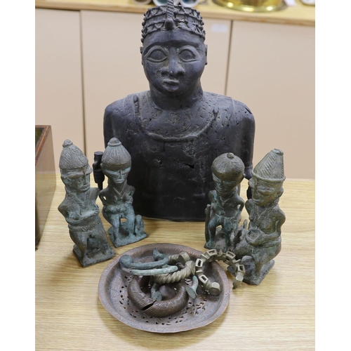 1380 - A group of Nigerian cast metal figures, bangles and a dish,  tallest 36 cms high.