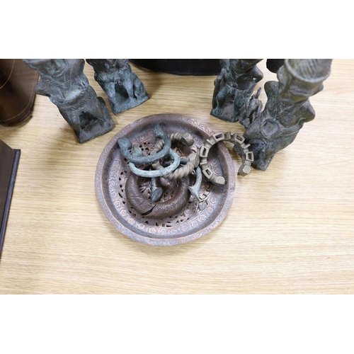 1380 - A group of Nigerian cast metal figures, bangles and a dish,  tallest 36 cms high.