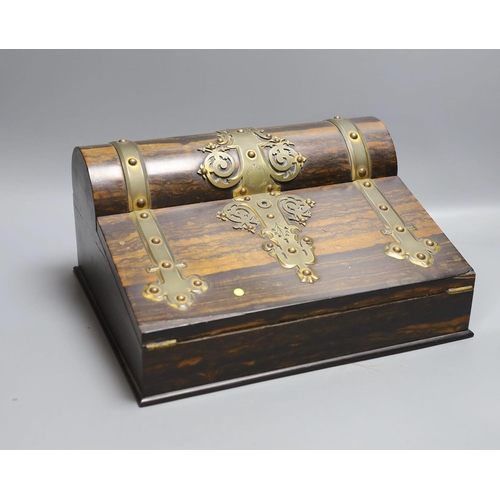 1383 - A Victorian coromandel stationery box with brass mounts, 32 cms wide.