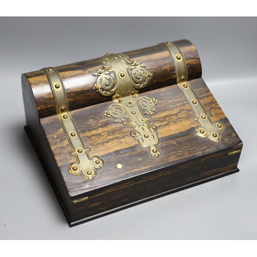 1383 - A Victorian coromandel stationery box with brass mounts, 32 cms wide.