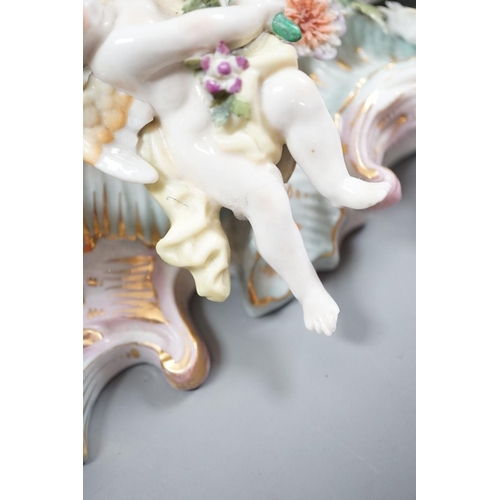 1384 - Two Sitzendorf porcelain ceiling shades, a similar wall bracket and a Dresden white glazed wall brac... 