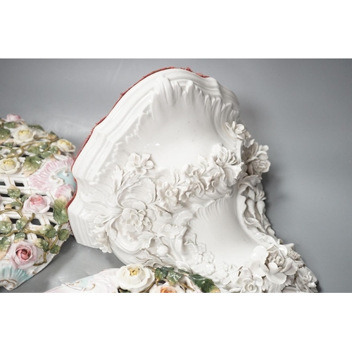 1384 - Two Sitzendorf porcelain ceiling shades, a similar wall bracket and a Dresden white glazed wall brac... 
