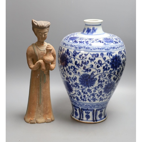 1385 - A large Chinese blue and white meiping and a Tang style pottery figure (2), vase 37 cms high.... 