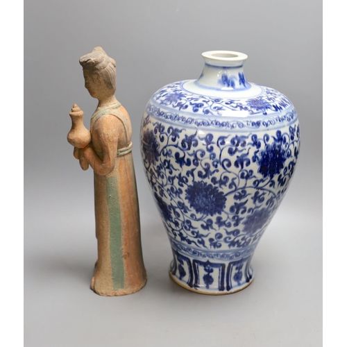 1385 - A large Chinese blue and white meiping and a Tang style pottery figure (2), vase 37 cms high.... 