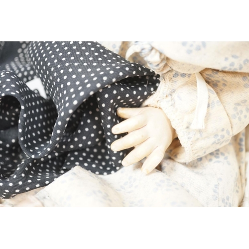 1389 - A German Porzellanfabrik Burggrab bisque headed doll, one other bisque headed doll