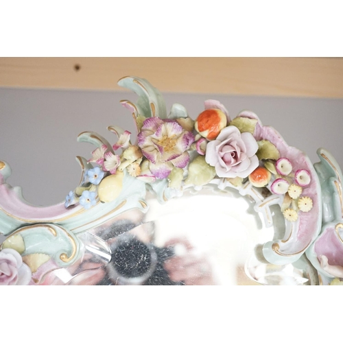 1391 - Two German porcelain easel mirrors and a Belleek easel mirror, tallest 43cm
