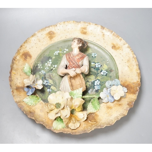 1392 - A Continental terracotta wall plaque and a Poutney & Co plaque (2) 39cm