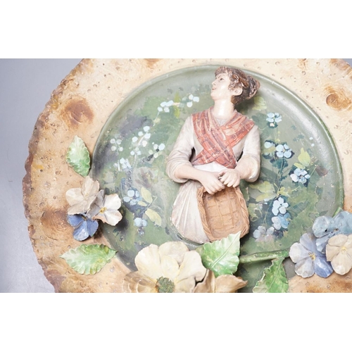 1392 - A Continental terracotta wall plaque and a Poutney & Co plaque (2) 39cm