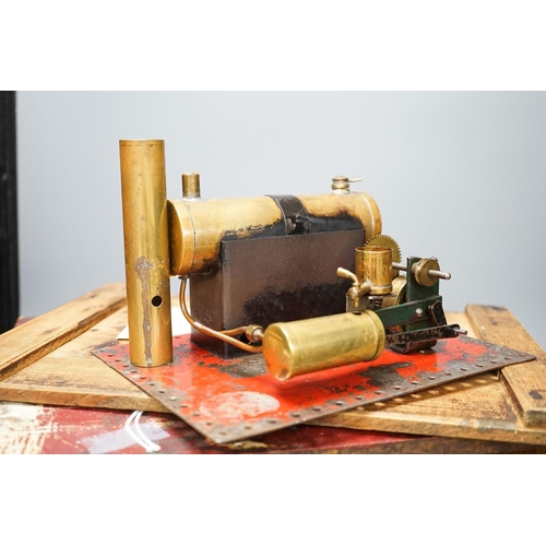 1397 - A Marklin spirit-fired live steam stationary engine with 10cm flywheel, 1920’s, and a smaller statio... 