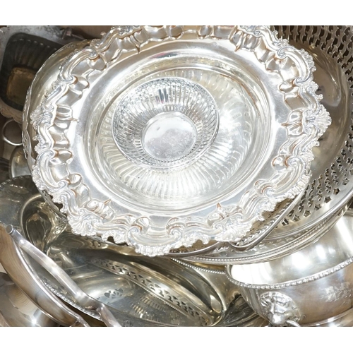 1399 - A large quantity of assorted Victorian and later silver plated ware