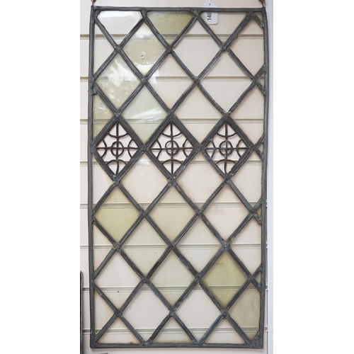 1407 - An antique lead and stained glass panel, possibly Elizabethan. 81x42cm
