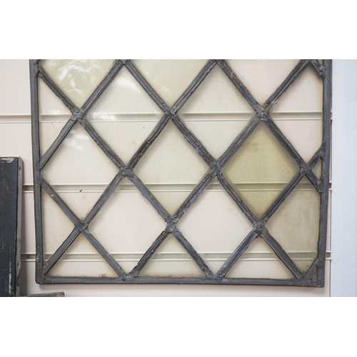 1407 - An antique lead and stained glass panel, possibly Elizabethan. 81x42cm