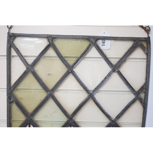 1407 - An antique lead and stained glass panel, possibly Elizabethan. 81x42cm
