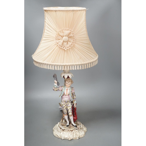 1408 - A German porcelain 'matador' lamp and shade 57cm total