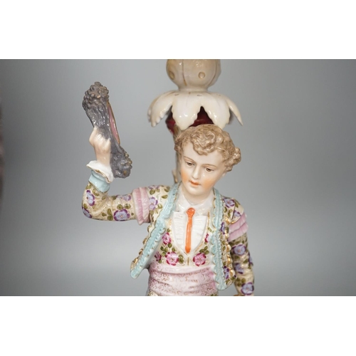 1408 - A German porcelain 'matador' lamp and shade 57cm total