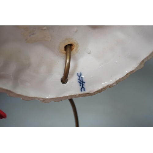 1408 - A German porcelain 'matador' lamp and shade 57cm total