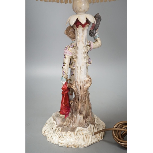 1408 - A German porcelain 'matador' lamp and shade 57cm total