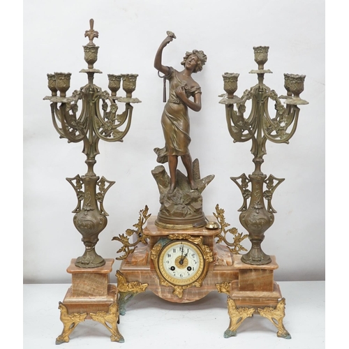 1417 - A French onyx and spelter figural clock garniture 66cm
