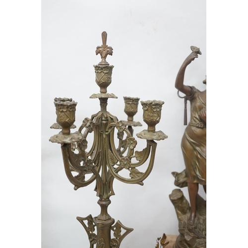 1417 - A French onyx and spelter figural clock garniture 66cm