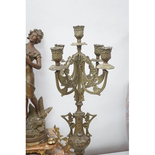 1417 - A French onyx and spelter figural clock garniture 66cm