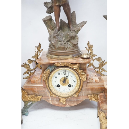 1417 - A French onyx and spelter figural clock garniture 66cm