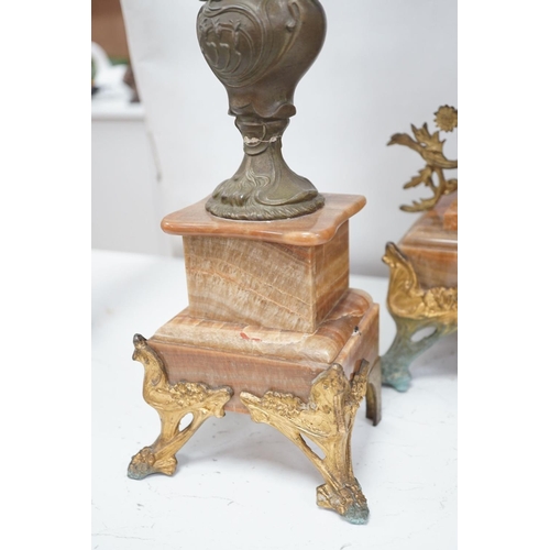 1417 - A French onyx and spelter figural clock garniture 66cm
